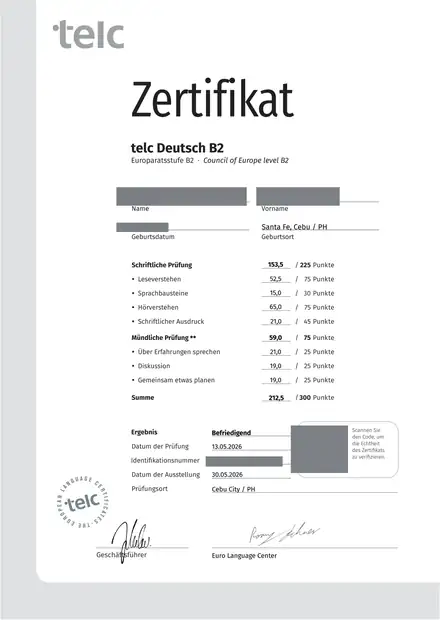 German B2 exam certificate with a Befriedigend result and personal details removed